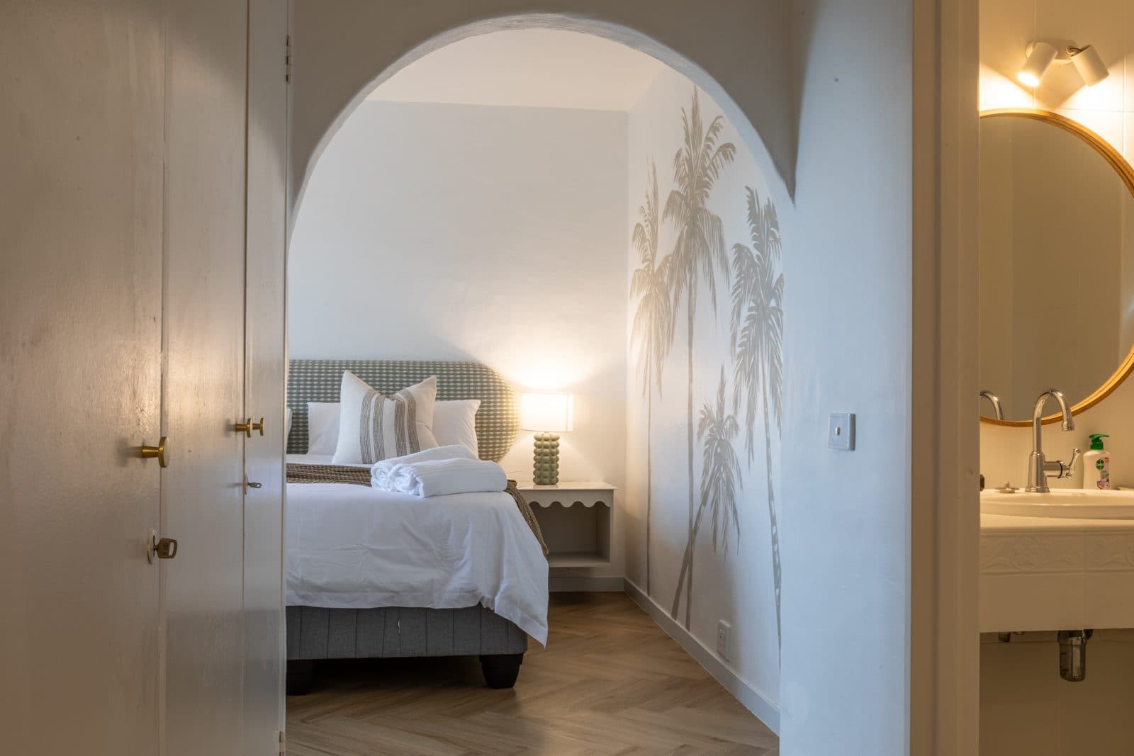Arched doorway into the main bedroom